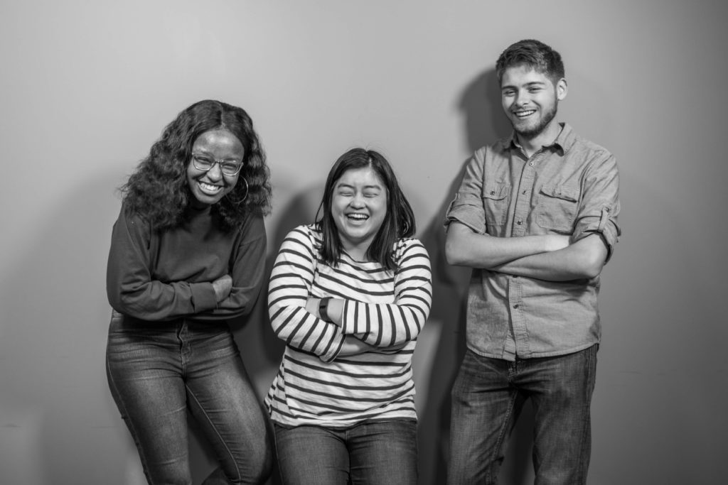 Photo of three co-hosts. Left to right: Nyawira Nyota, Sam Chan, Luke Shealy